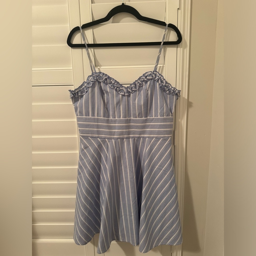 Blue & white striped dress. Slight A line flare with ruffle sweetheart.